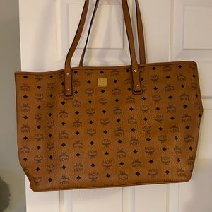 Authentic MCM large Tote with wristlet .20”W and 13”L
